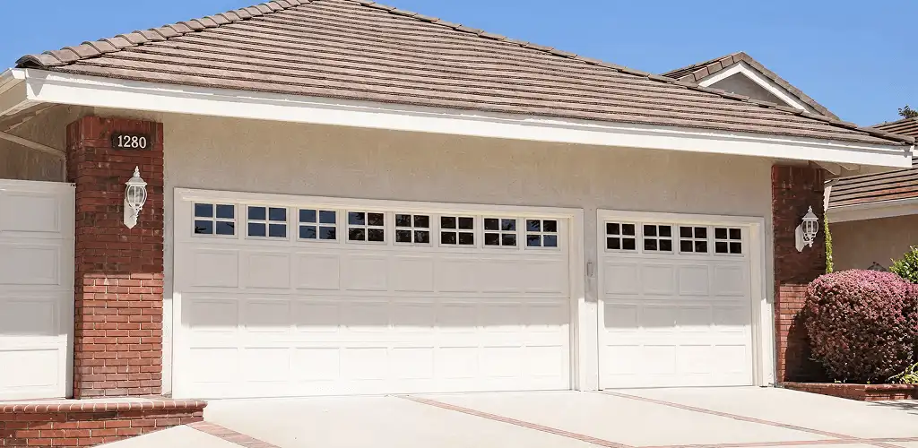 Residential garage door repair service for a double garage door in Glendale, AZ